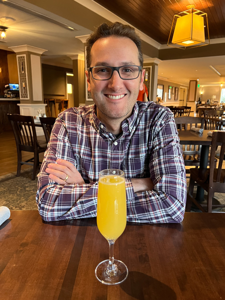 Tom with mimosa at Village Social