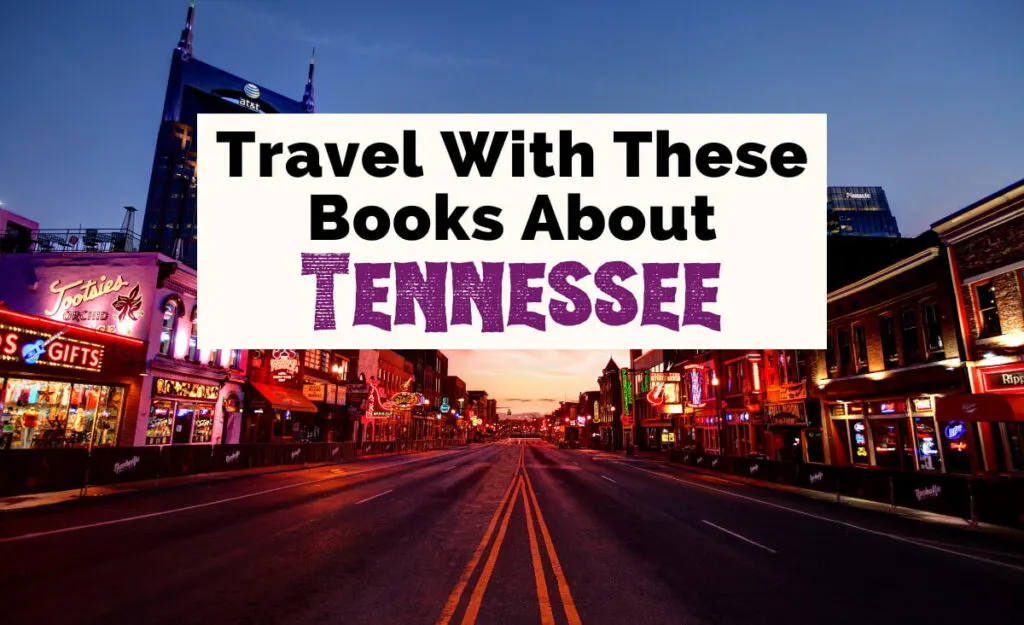 Travel with these Books About Tennessee featured image with photo of Downtown Nashville buildings lit up at night with road at the center