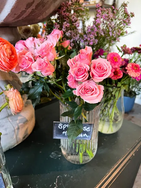 Flora Asheville NC Shop with pink flowers in vase on table