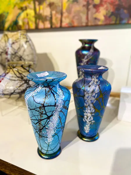 Grovewood Gallery Shop in Asheville NC with light and dark blue vases on display