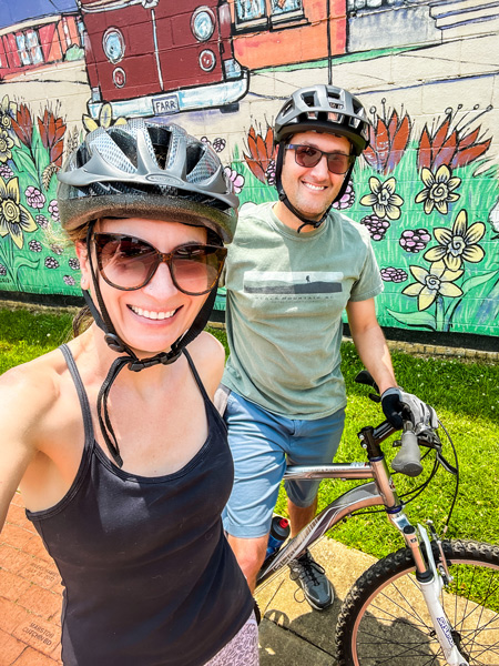 Christine and Tom selfie in front of mural