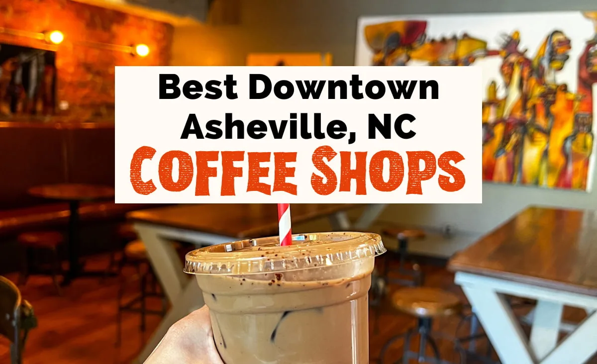 Coffee Shops In Downtown Asheville NC featured image of The Rhu's upstairs seating area with paintings, tables, and white hand holding up to-go ice coffee with red and white striped paper straw