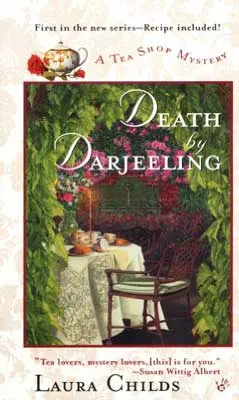 Death by Darjeeling by Laura Childs book cover with illustrated set table with table cloth and chair surrounded by flowers and greenery