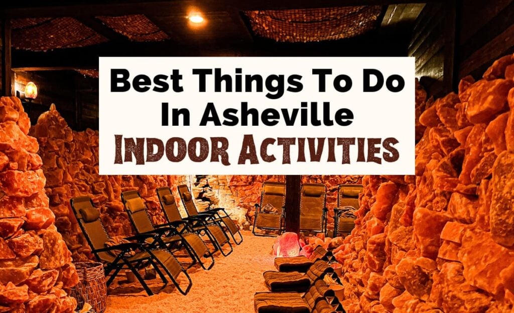 Best Indoor Activities In Asheville NC Featured image with image of the Asheville Salt Cave, which is an indoor room with pink (but orange lighting) salt on ground, ceiling, and walls with reclining chairs and text that reads "best things to do in Asheville Indoor Activities"