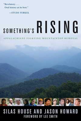 Something’s Rising by Silas House and Jason Howard book cover with image of blue and white foggy mountains with dark green landscape
