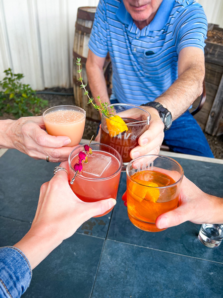 Cheers with cocktails at Oak and Grist