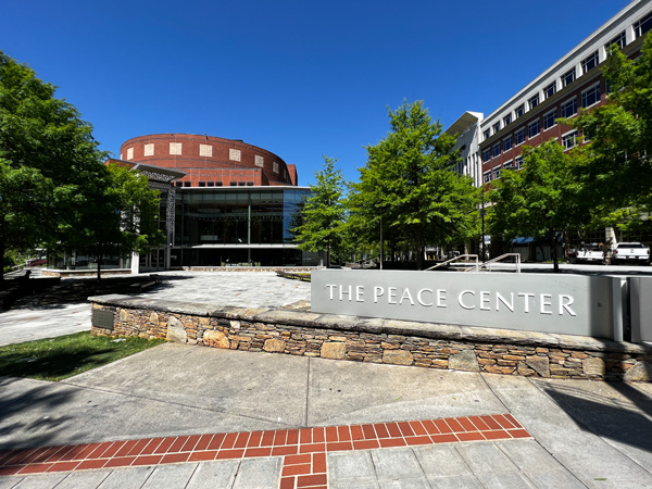 Outside of the Peace Center in Greenville, SC, which is a multi-storied building filled with windows