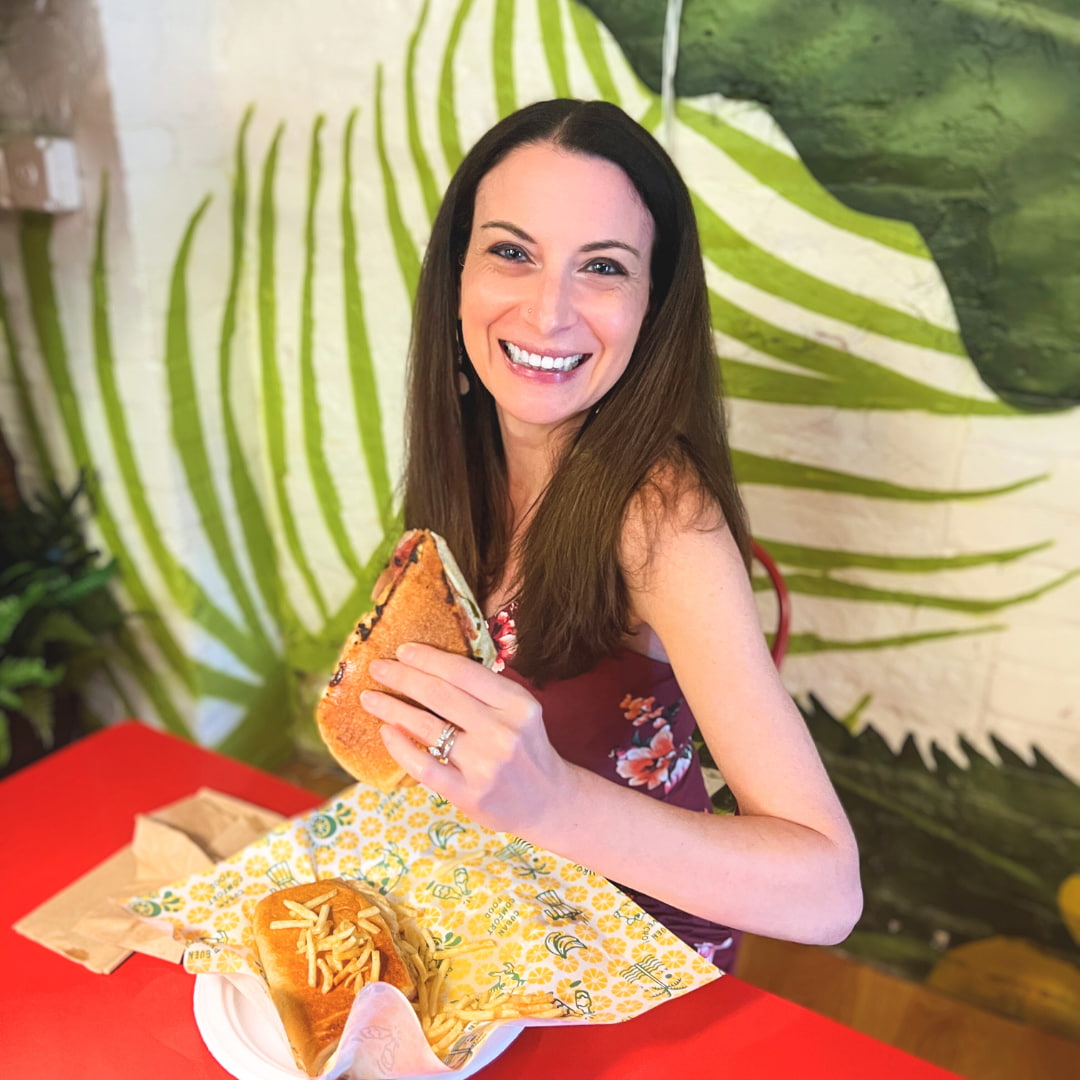 Christine eating Guajiro Cuban food