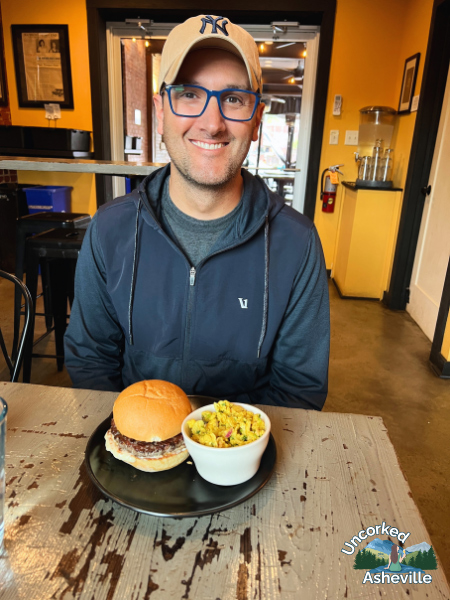 Tom with burger at Zadie's Market Marshall NC